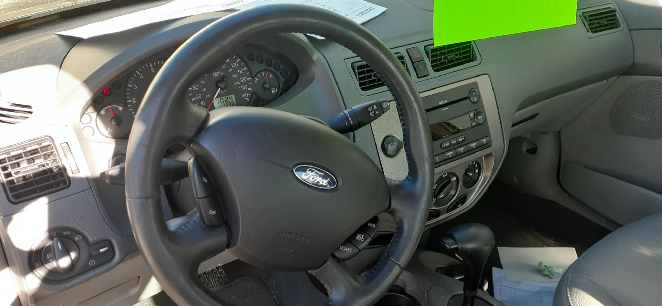 2005 Ford Focus ZX4 S (1FAFP34N15W) with an 2.0L L4 DOHC 16V engine, located at 2015 Cambell Street, Rapid City, SD, 57701, (605) 342-8326, 44.066433, -103.191772 - Photo #4